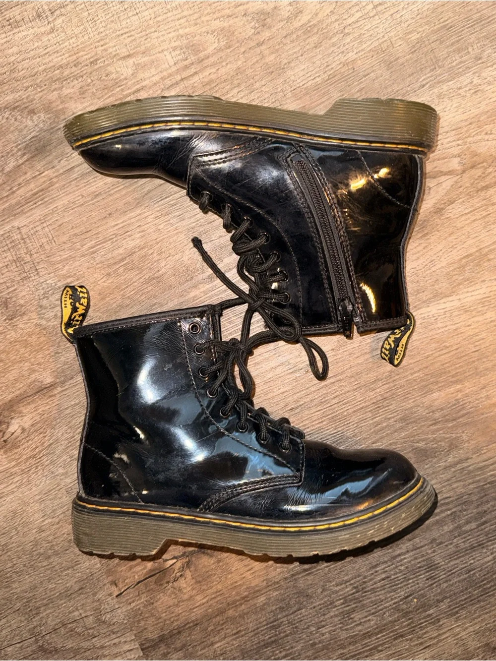 Dr. Martens Black Patent Lace-Up Ankle Boots with Yellow Heel Loop
